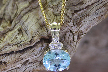 Blue Topaz & Diamond Pendant